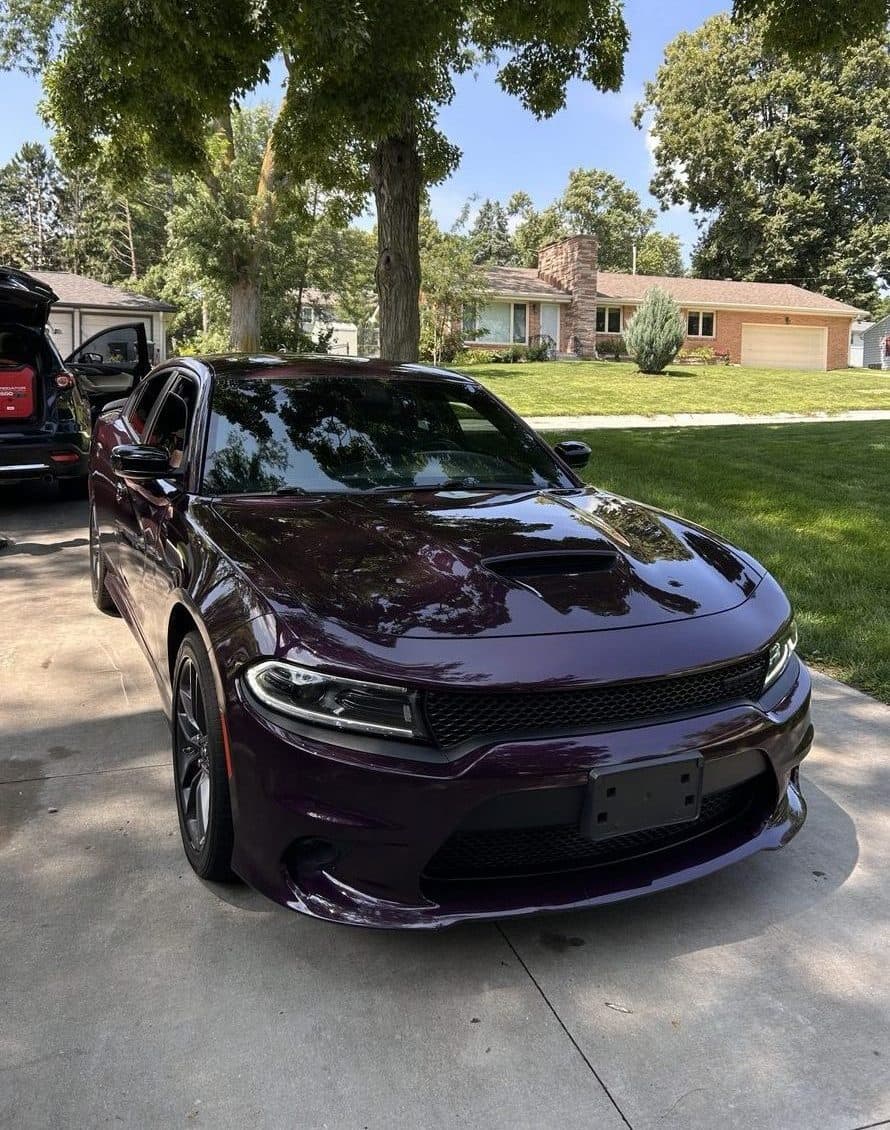 Detailed purple Dodge Charger with mirror finish